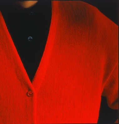 Detail of a red garter-stitch sweater