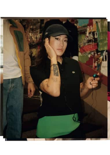 black short sleeve polo shirt worn by Peggy Gou