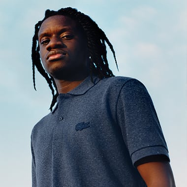 Salif Gueye wears the Loop Polo from Lacoste