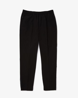 Pantal&oacute;n deportivo resistente al agua para hombre