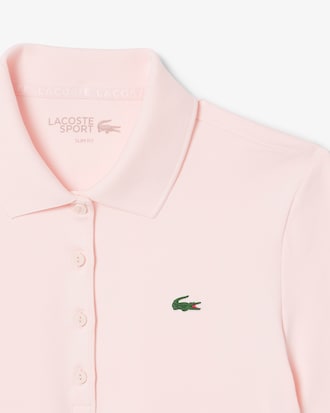 Polo de golf elástico con protección UV y corte entallado para mujer
