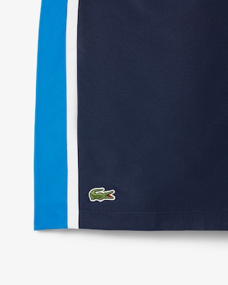 Shorts de tenis ligeros con rayas color block para hombre