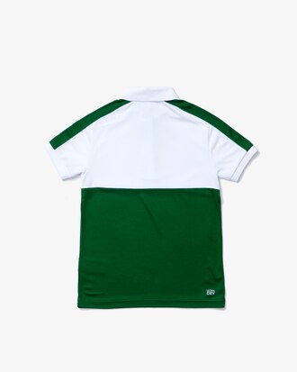 Polo Lacoste en piqu&eacute; transpirable de color block para ni&ntilde;o