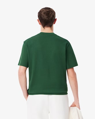 Playera de piqué con escudo bordado