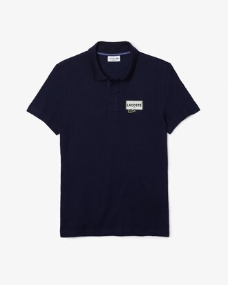 Polo para hombre Heritage Lacoste de corte regular en piqu&eacute; de algod&oacute;n con insignia