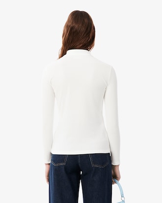 Polo femme slim fit &agrave; manches longues en piqu&eacute; stretch