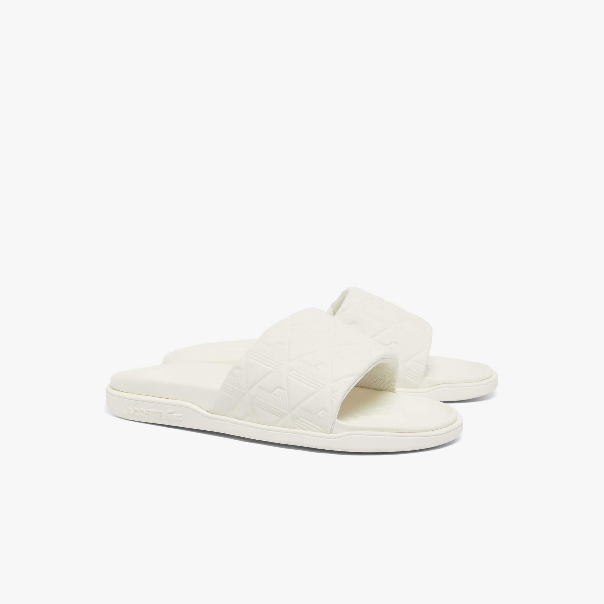 【LACOSTE】 SERVE SLIDE DUALモノグラムエンボスライドサンダル LACOSTE】 SERVE SLIDE DUALモノグラムエンボスライドサンダル