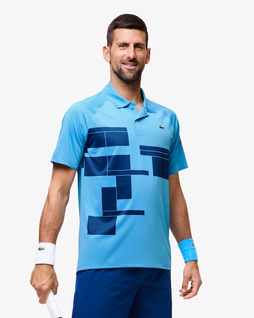 Lacoste Boys Novak Djokovic Crossed Polo Shirt in Blue