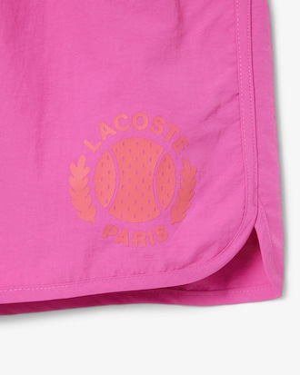 Traje de baño corto para hombre con detalles de insignia