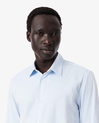 Camisa slim fit de popelina el&aacute;stica a rayas