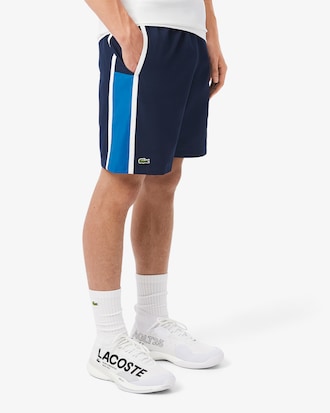 Shorts de tenis ligeros con rayas color block para hombre