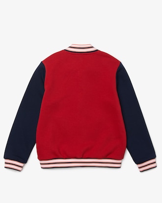 Chamarra infantil de felpa bicolor con parche de cocodrilo