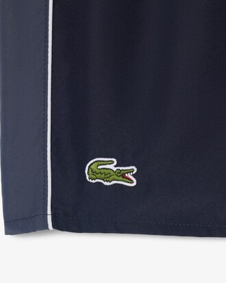 Pantalones cortos de ba&ntilde;o de longitud media con bloques de color