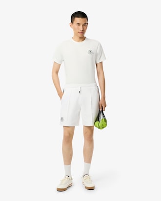 Shorts Heritage de tenis con detalles de insignia Ultra seco para hombre