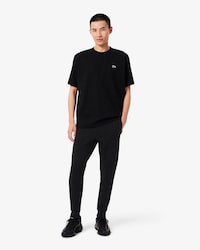 Pantalon de surv&ecirc;tement ajust&eacute; en jersey