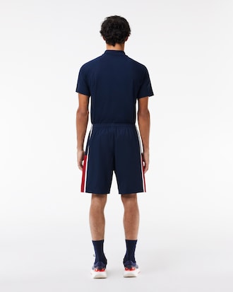 Shorts de tenis ligeros con rayas color block para hombre