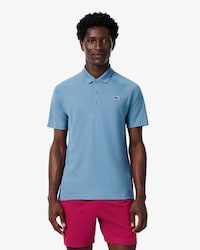 Polo homme Lacoste Sport en tissu r&eacute;sistant et respirant