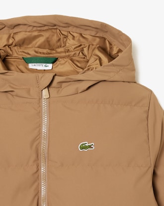 Manteau matelassé à capuche avec crocodile au dos