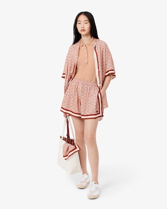 Polo femme L.12.D slim fit en piqu&eacute; de coton stretch