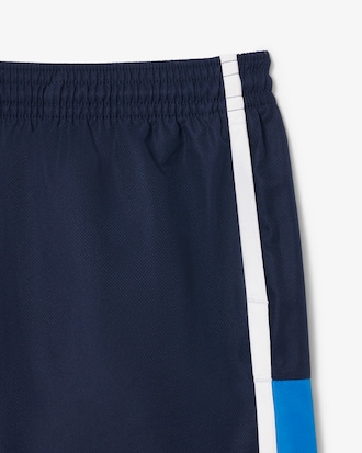 Shorts de tenis ligeros con rayas color block para hombre