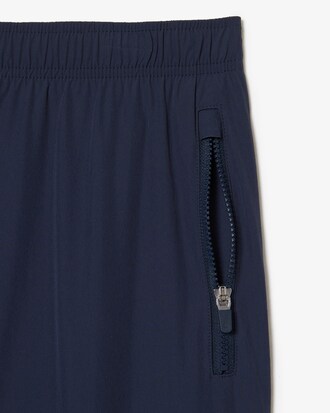 Pantalon de surv&ecirc;tement homme Lacoste stretch et d&eacute;perlant