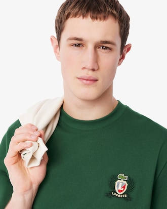 Playera de piqué con escudo bordado