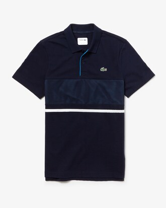 Polo Lacoste SPORT para Tennis de algod&oacute;n ultraligero y malla para hombre
