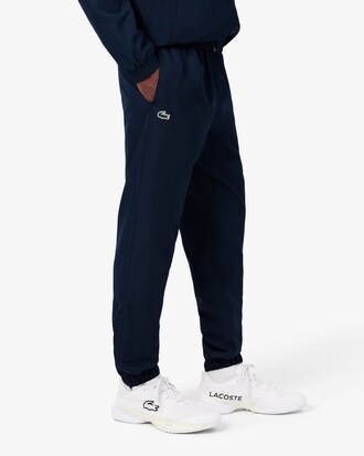 Pantalon de surv&ecirc;tement uni Lacoste SPORT en tissu l&eacute;ger