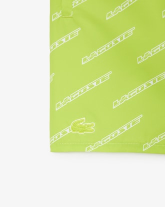 Traje de ba&ntilde;o de ni&ntilde;o Lacoste en poli&eacute;ster reciclado con estampado