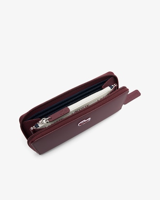 Portefeuille zippé L.12.12 Concept petit piqué uni 12 cartes