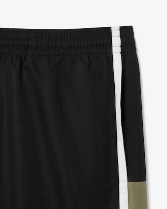 Shorts de tenis ligeros con rayas color block para hombre