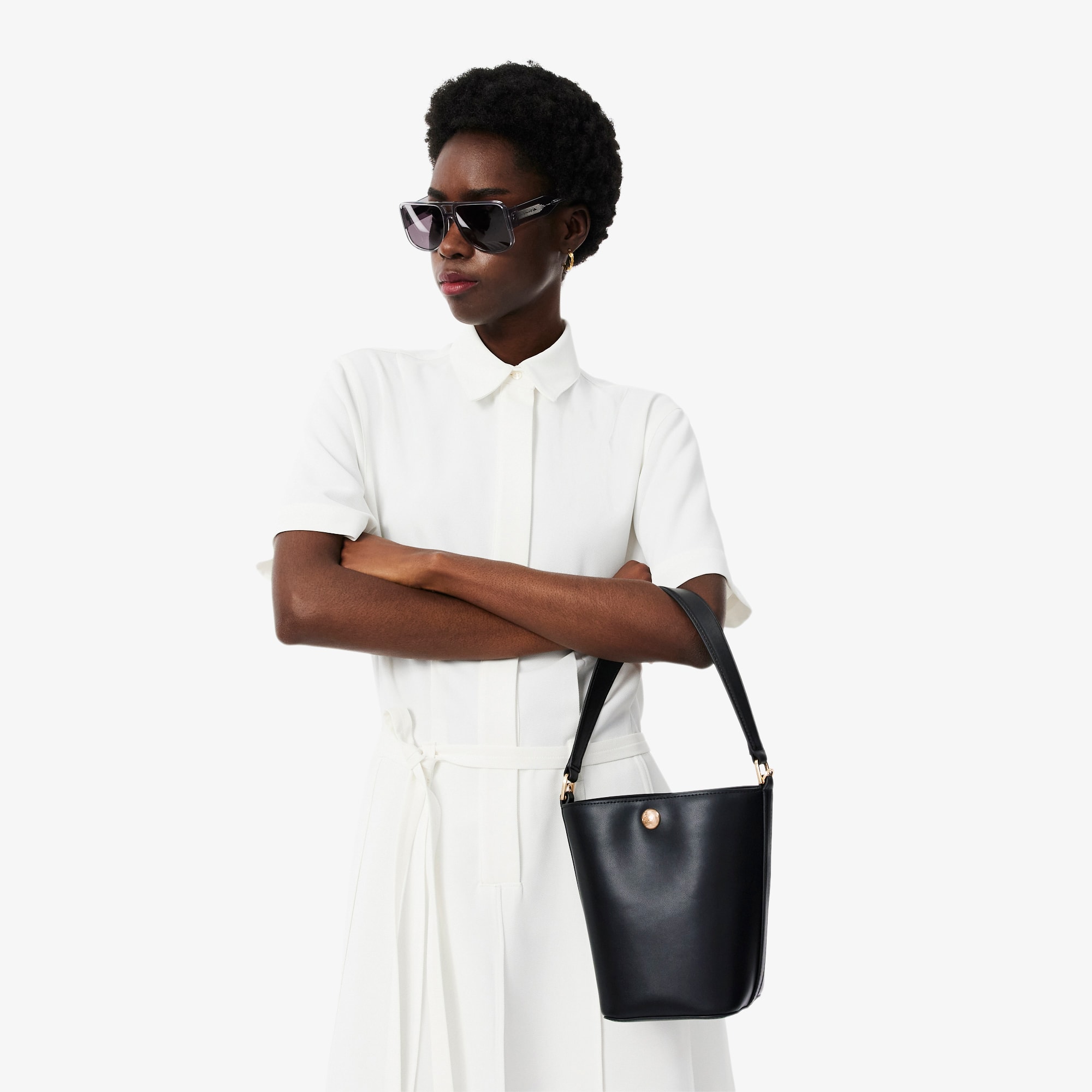 Small Tennis Bliss Leather Bucket Bag - Crossbody Bags - New In