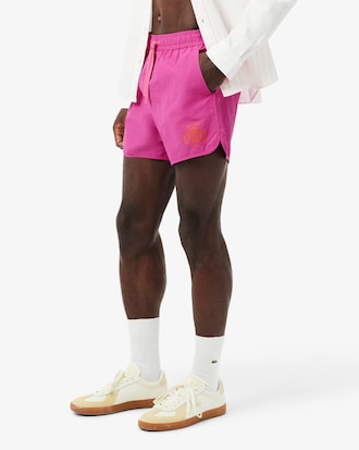 Traje de baño corto para hombre con detalles de insignia