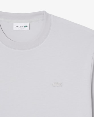 Playera con firma bordada