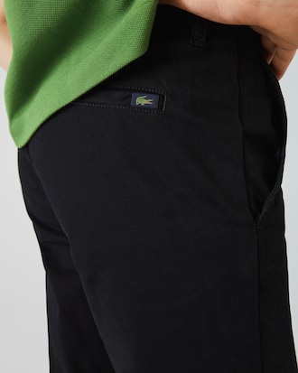 Pantalones estilo chinos slim fit en gabardina stretch para hombre