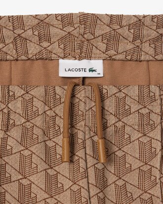 Pantalones deportivos acampanados con monograma para mujer