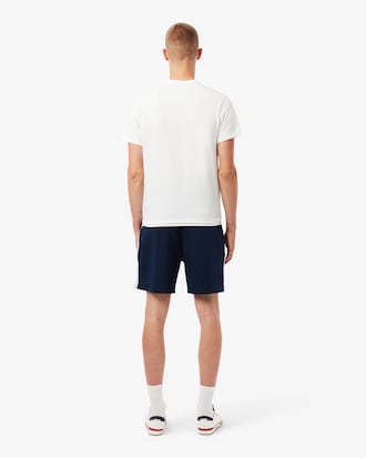 Shorts Heritage de tenis con detalles de insignia Ultra seco para hombre