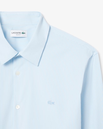 Camisa slim fit de popelina el&aacute;stica a rayas