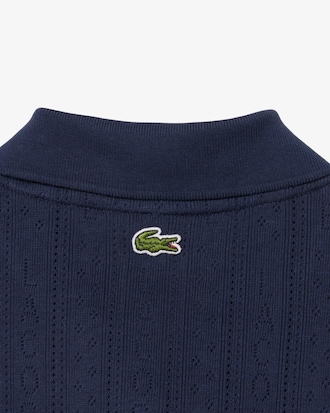 Polo L.12.D corte entallado con marca de pointelle