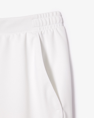 Shorts de tenis elásticos de corte regular