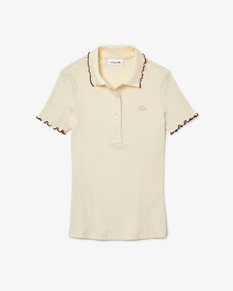 Polo Lacoste slim fit c&ocirc;tel&eacute; avec d&eacute;tails volant&eacute;s color&eacute;s