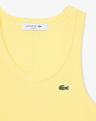 Playera sin mangas de algodón de corte ajustado para mujer