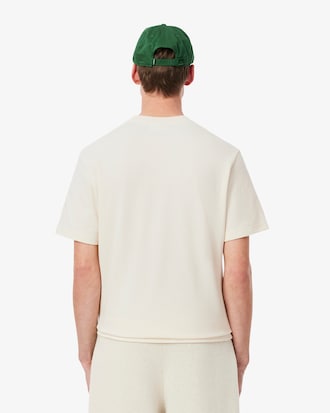 Playera de piqué con escudo bordado