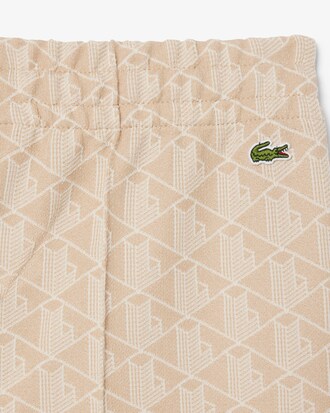 Pantalones deportivos acampanados con monograma para mujer