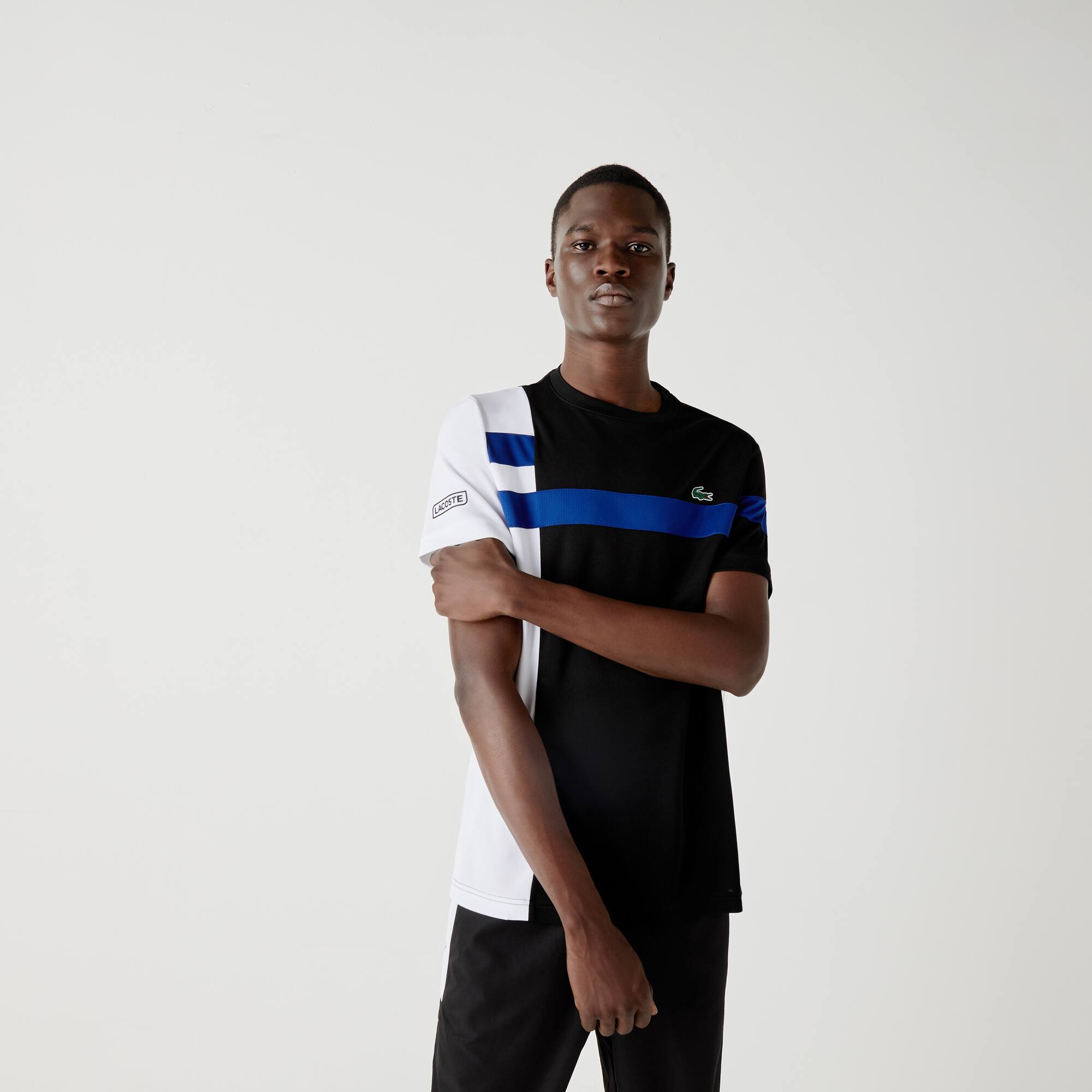 Click to view more detailed imagery on our partner's website Lacoste Men's Sport Colorblock Breathable Piqué Tennis T-shirt In Black,white,blue,black