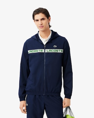 Conjunto deportivo de tenis con franjas con logo