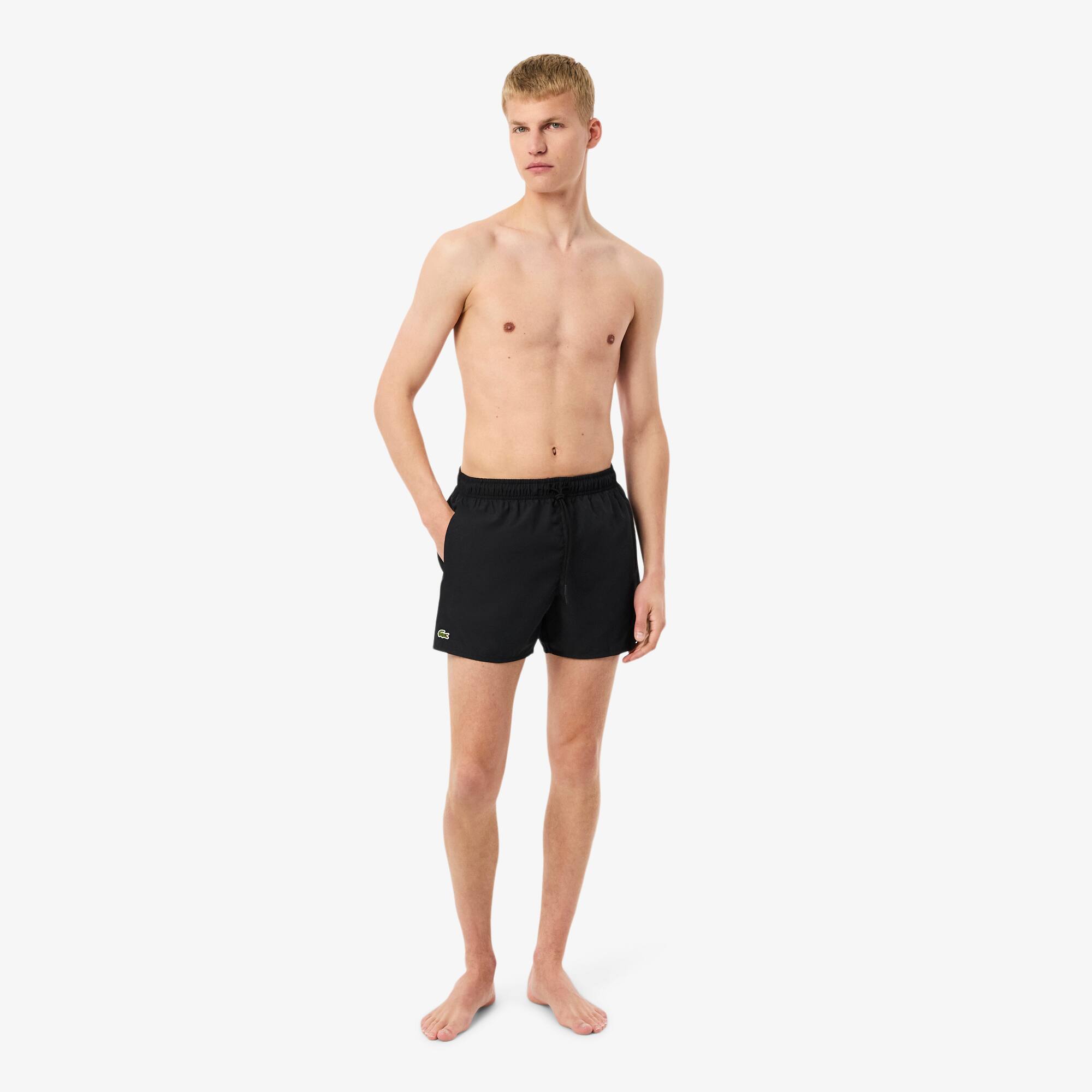 Lacoste Men's Light Quick-Dry Swim Shorts. 1