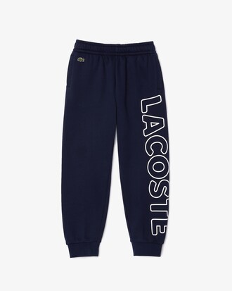 Pantal&oacute;n deportivo de felpa con letras para ni&ntilde;o