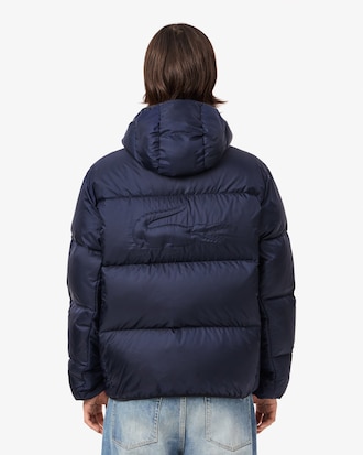 Chamarra corta abullonada hidrófuga con gorro