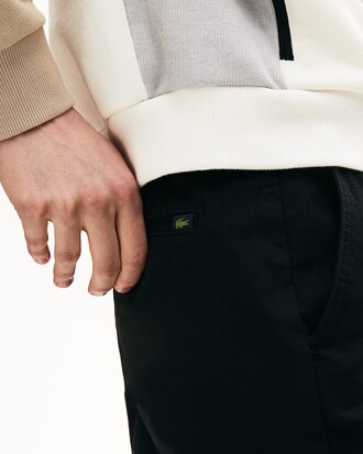 Pantalones estilo chinos slim fit en gabardina stretch para hombre